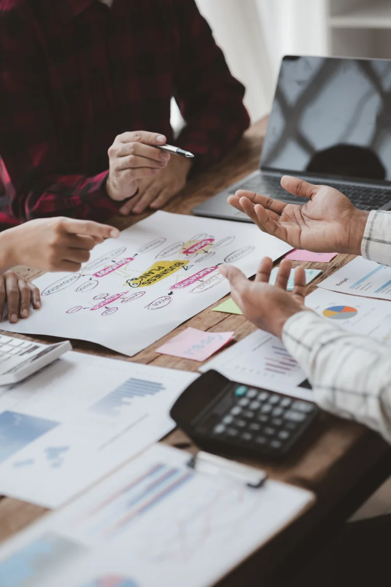 company meeting room has businessmen and finance man